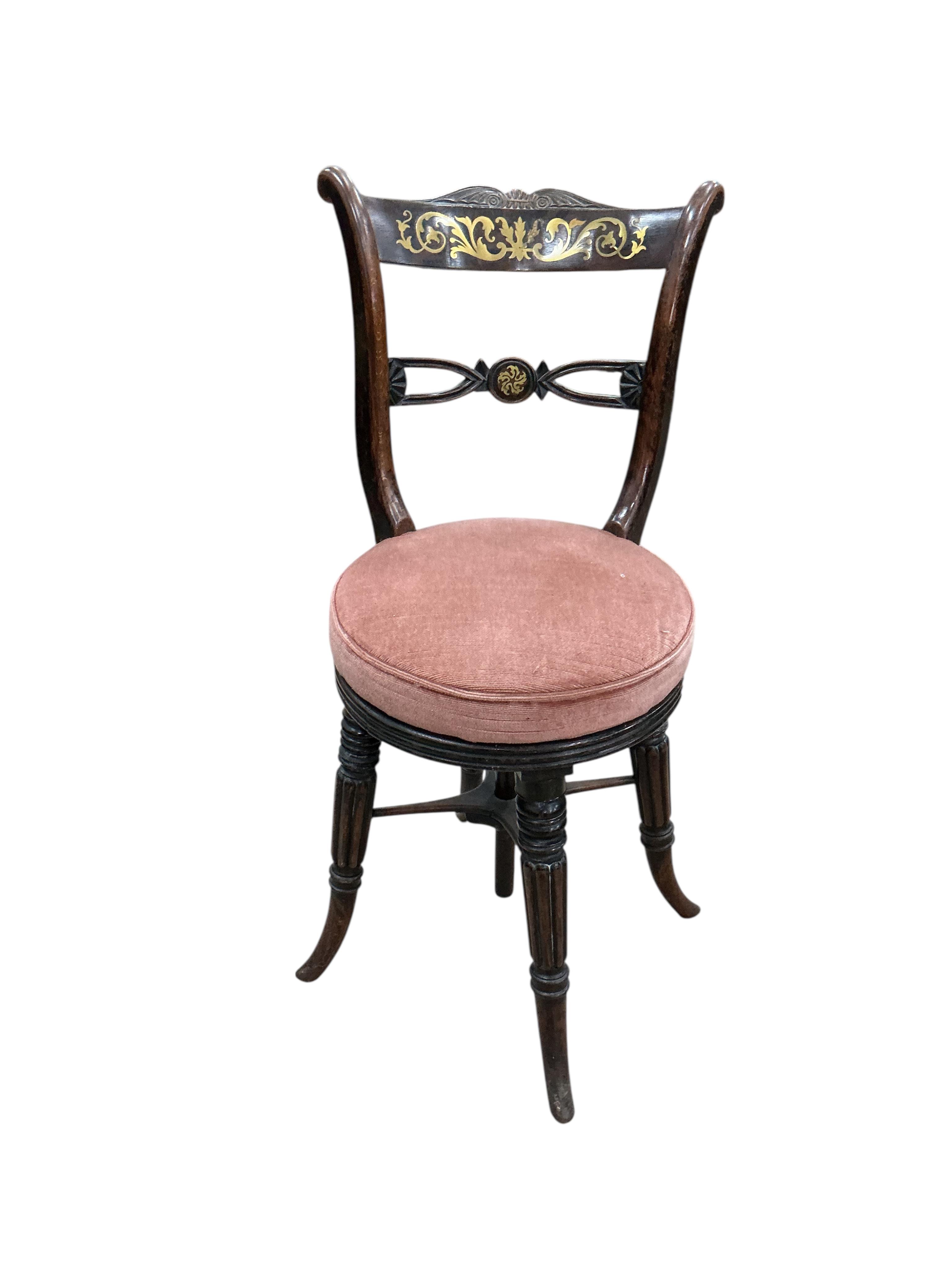 A Regency cut brass inlaid adjustable music stool, width 39cm